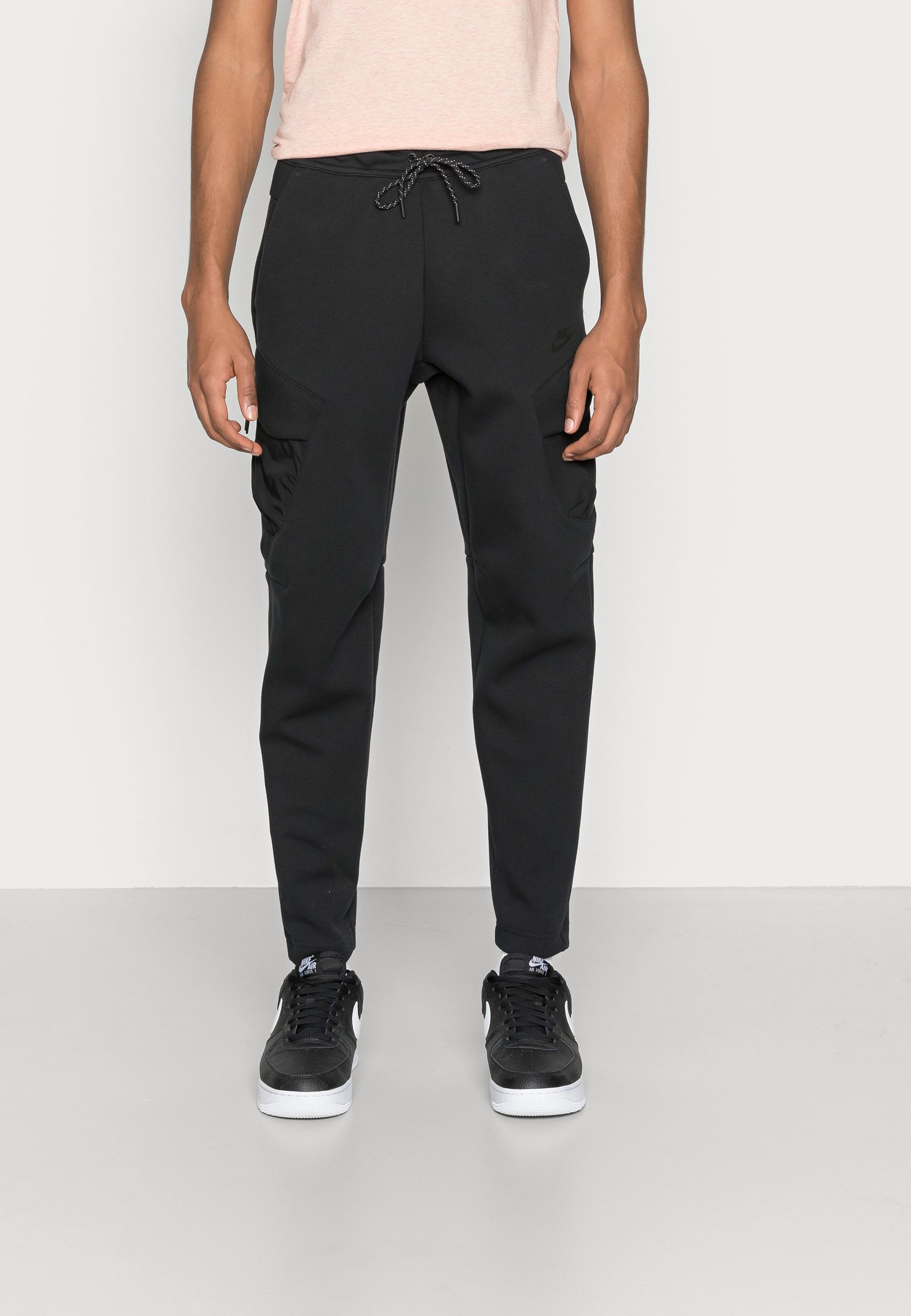 Nike FLEECE UTILITY PANT deportivos - black/negro - Zalando.es