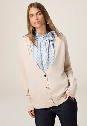 SCOLLO A V CON BOTTONI DORATI - Cardigan - beige