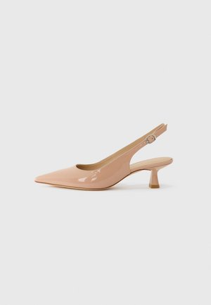 Patented slingback shoes in light pink, featuring a pointed toe, low block heel, and an adjustable strap with a circular buckle detail.