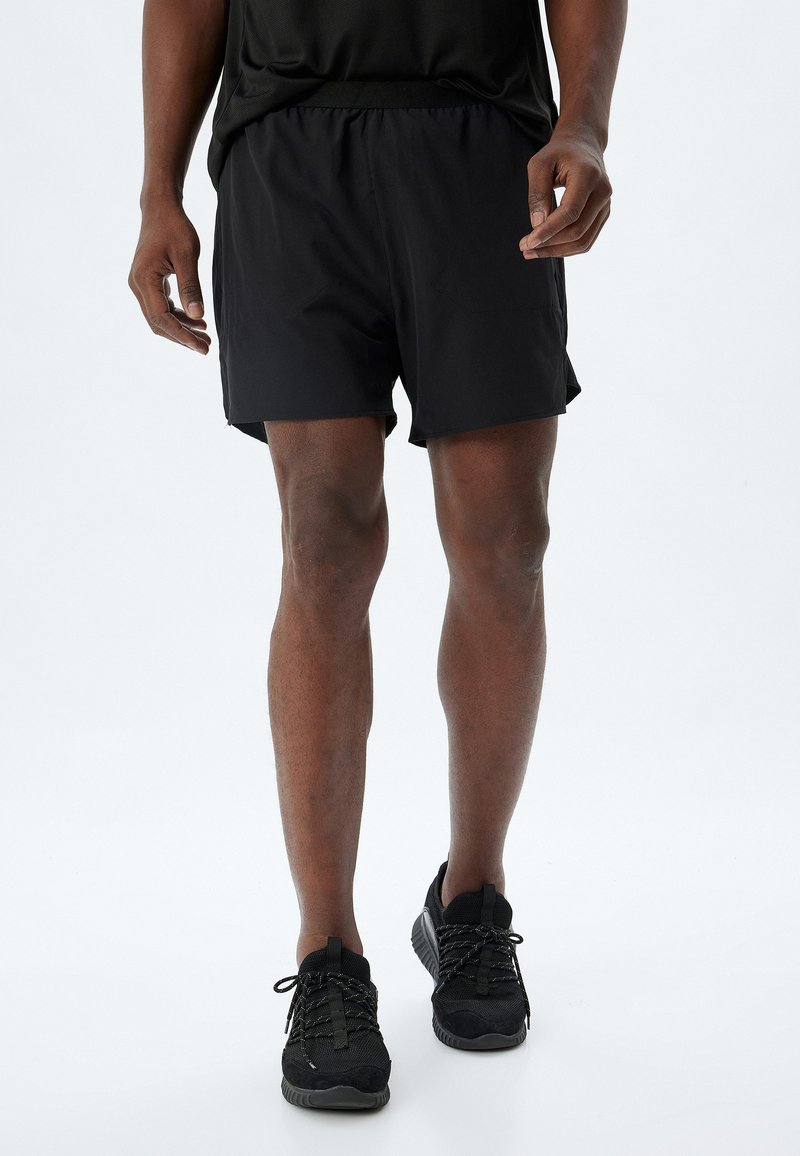 Koton Shorts - black