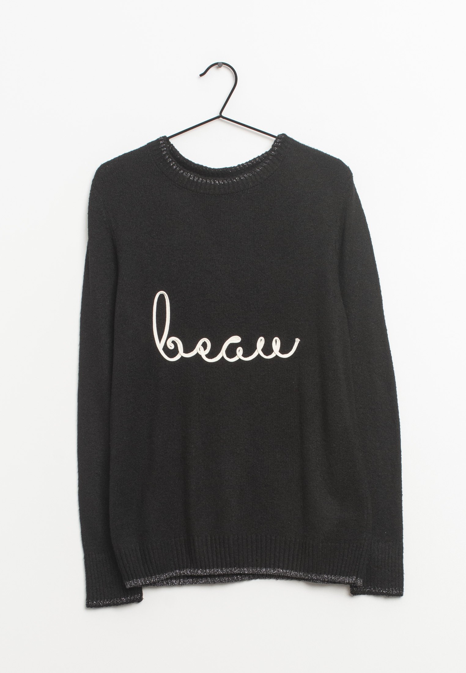 next black jumper