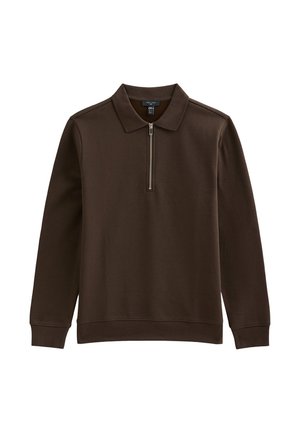 Suéter marrón hecho de un tejido suave y liso, con collar con cremallera, mangas largas y un corte relajado para mayor comodidad.