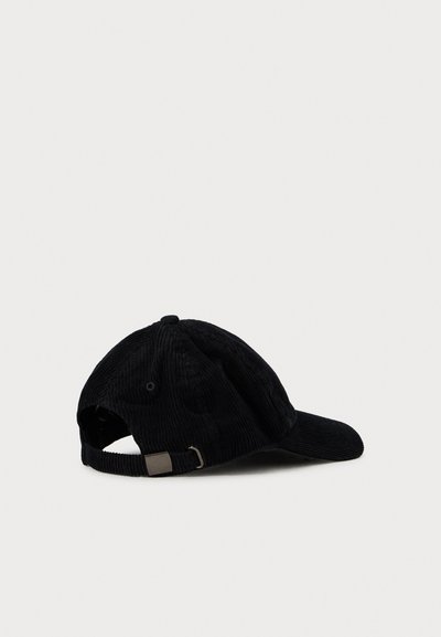 Black corduroy baseball cap with adjustable strap and metal buckle on a white background.