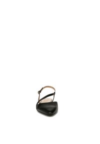 Black leather slingback shoe with a pointed toe, minimalistic design, thin ankle strap, and a smooth texture on the upper.
