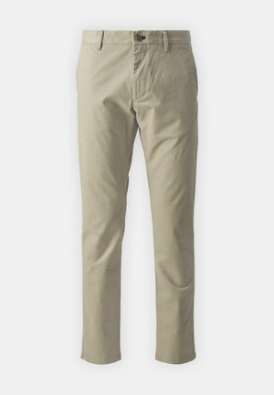 Chinos en coton beige à coupe droite, avec une fermeture éclair, un bouton, et sans motifs ni accents en matériel visibles.