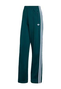 Dark green athletic pants with a relaxed fit, featuring white side stripes and a small white logo on the front. Material appears smooth and lightweight.