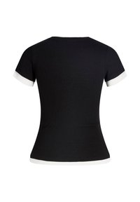 Black short-sleeved top with a fitted shape. Features white trim on the sleeves and neckline, made from stretchy cotton material.