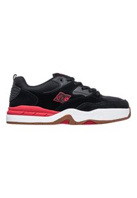 Black skate shoes with red accents; made of suede and mesh, featuring a padded collar, white midsole, and rubber outsole with grip pattern.