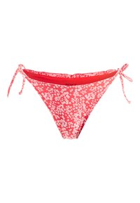 Červené bikiny s bielym kvetinovým vzorom, dizajn so zaviazaním na boku, hladká textúra a kontrastný červený pás. Viditeľné logo značky.