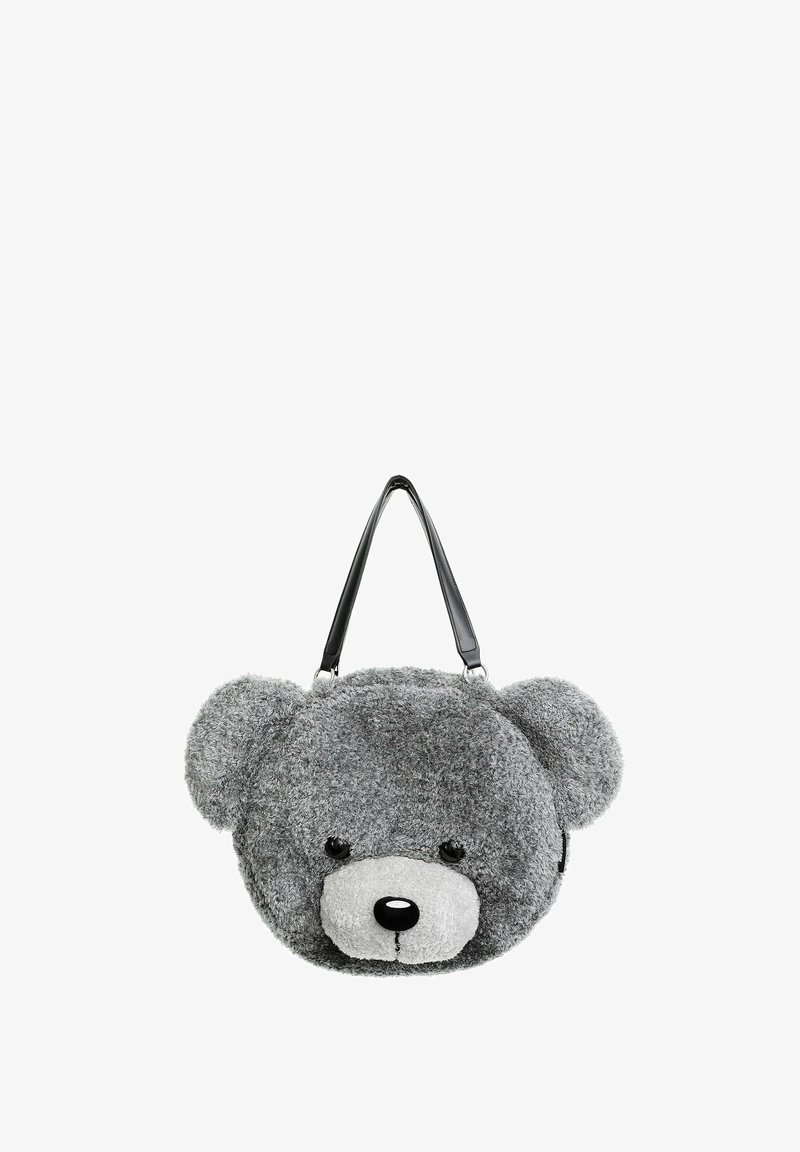 Bolso de mano gris de peluche con forma de oso, con correas negras de piel sintética, que presenta orejas redondas y un detalle facial cosido. Textura suave con un diseño redondeado.