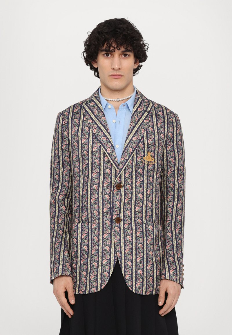 Floral patterned blazer in navy and cream, featuring vertical stripes, a notch lapel, two buttons, and a chest pocket.