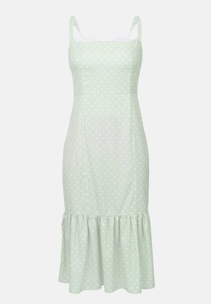 Ljusgrön prickig klänning med tunna axelband, spetsdetalj vid halsringningen, figursydd midja och en volangkant längst ner.