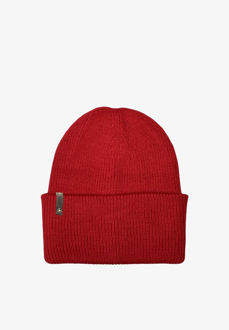 Red knitted beanie hat with a ribbed texture and a folded cuff. Features a small metallic tag on the side for branding.