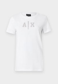 Λευκό κοντομάνικο T-shirt με στρογγυλή λαιμόκοψη, με λογότυπο "A | X" σε ασημί μεταλλικά στρας και κείμενο "Armani Exchange" από κάτω στο μπροστινό μέρος.