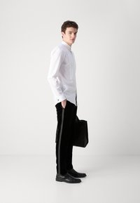 HUGO GETLIN - Suit trousers - black