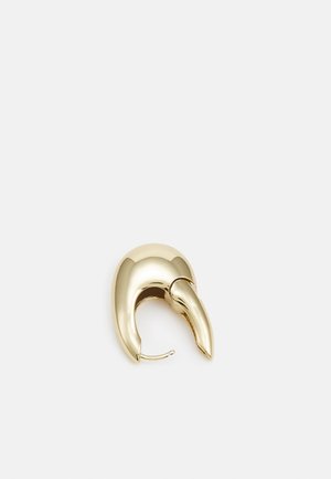Gold-tone metal earring with a sleek, curved design. Features a distinctive pointed shape, polished surface, and hinge closure.