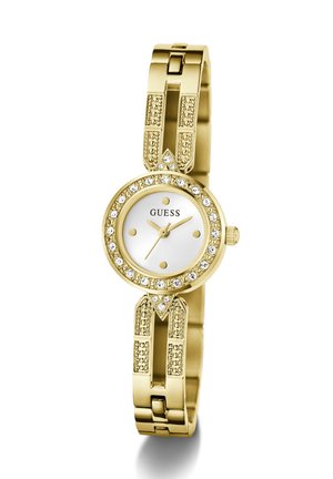 Ρολόι χειρός Guess με επιχρυσωμένο τόνο, με κρυστάλλινες λεπτομέρειες γύρω από το στρογγυλό λευκό καντράν και διακοσμητικούς κρίκους στο μπρασελέ, τρία χρυσά δείκτες και τέσσερις ώρες σημειωμένες με κουκκίδες.
