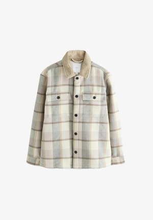 Kockás flanel dzseki krém, szürke és bézs színben, puha, textúrált gallérral és két melltással, fekete gombokkal.