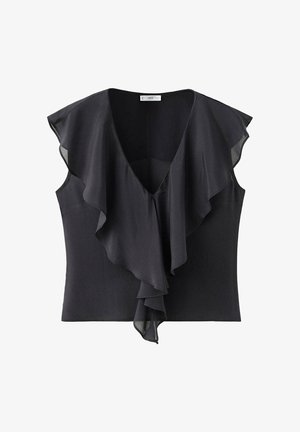 Blouse noire sans manches avec un profond col en V et un détail à volants superposés descendant devant et sur les épaules.