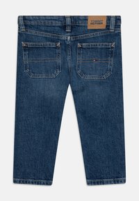 Tommy Hilfiger SKATER DESTRUCTIONS - Jeans Slim Fit - blue denim