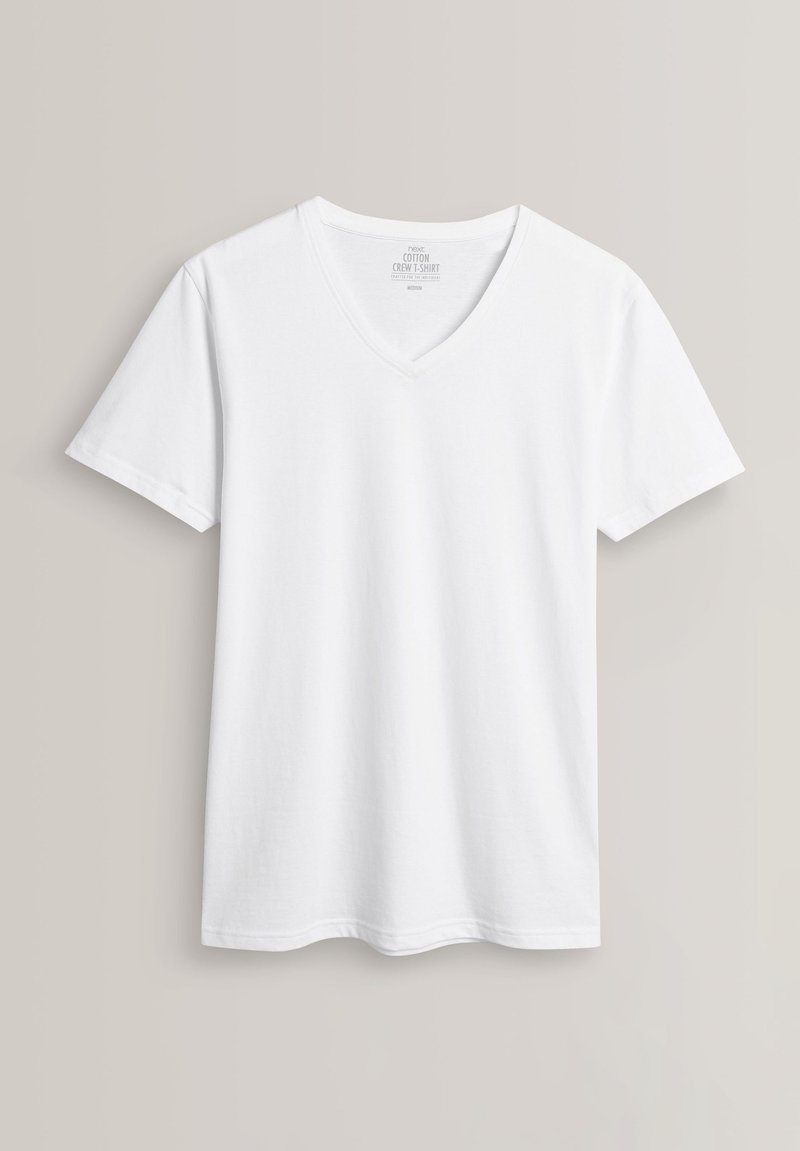 Tricou alb din bumbac cu decolteu în V și mâneci scurte, având o textură netedă și o croială clasică. Eticheta este vizibilă pe gulerul interior.