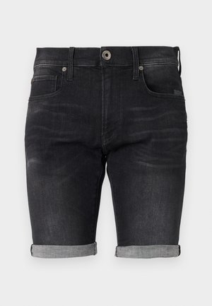 Shorts in denim nero con un design aderente, orli arrotolati e una cintura classica con chiusura a bottone frontale e tasche laterali.