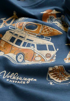 Navy blue fabric featuring printed designs of a Volkswagen bus, ice cream cone, bicycle, mountains, and detailed hiking boots.