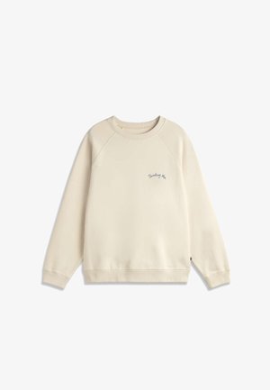 Sweatshirt beige à manches longues avec col rond et petit texte bleu marine « Thinking of u » sur la poitrine gauche.
