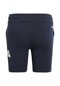 Pantaloni sportivi blu navy con vita elastica, dotati di tasche laterali e un dettaglio con logo bianco sul lato sinistro. Tessuto dalla texture liscia.