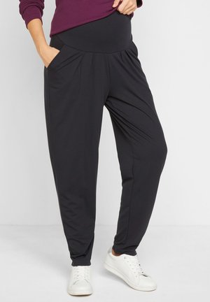 UMSTANDS-HAREMS - Pantaloni sportivi - black