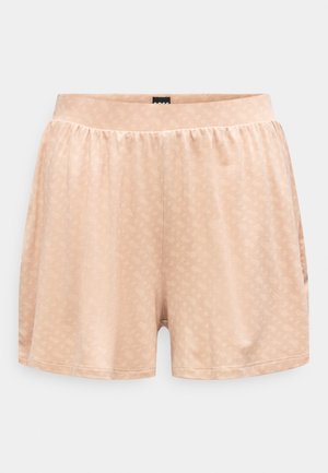 Svetlobéžové mäkké látkové šortky s jemným vzorom srdiečok, elastickým pásom a bočnými vreckami, zobrazené na jednoliatom pozadí.