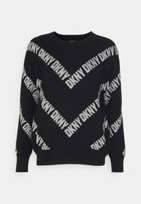 Schwarzer Pullover mit einem Zickzackmuster aus "DKNY" in hellgrauer Strickware. Lange Ärmel mit gerippten Bündchen. Weicher Stoff und lässige Passform.