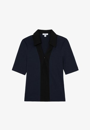 Granatowy krótki top z czarnym kołnierzem i pionowym czarnym paskiem z suwakiem z przodu.