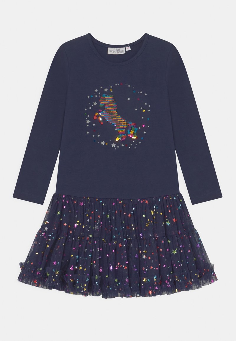 Robe bleu marine à manches longues avec une jupe en tulle superposée. Présente un design arc-en-ciel en sequins représentant un cheval, ainsi que des accents d'étoiles colorées sur la jupe.