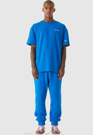 UNISEX  ESSENTIAL  - Pantaloni de trening - cobaltblue