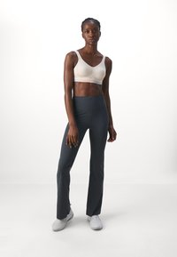 ICANIWILL NIMBLE FLARED - Legingi - dark green