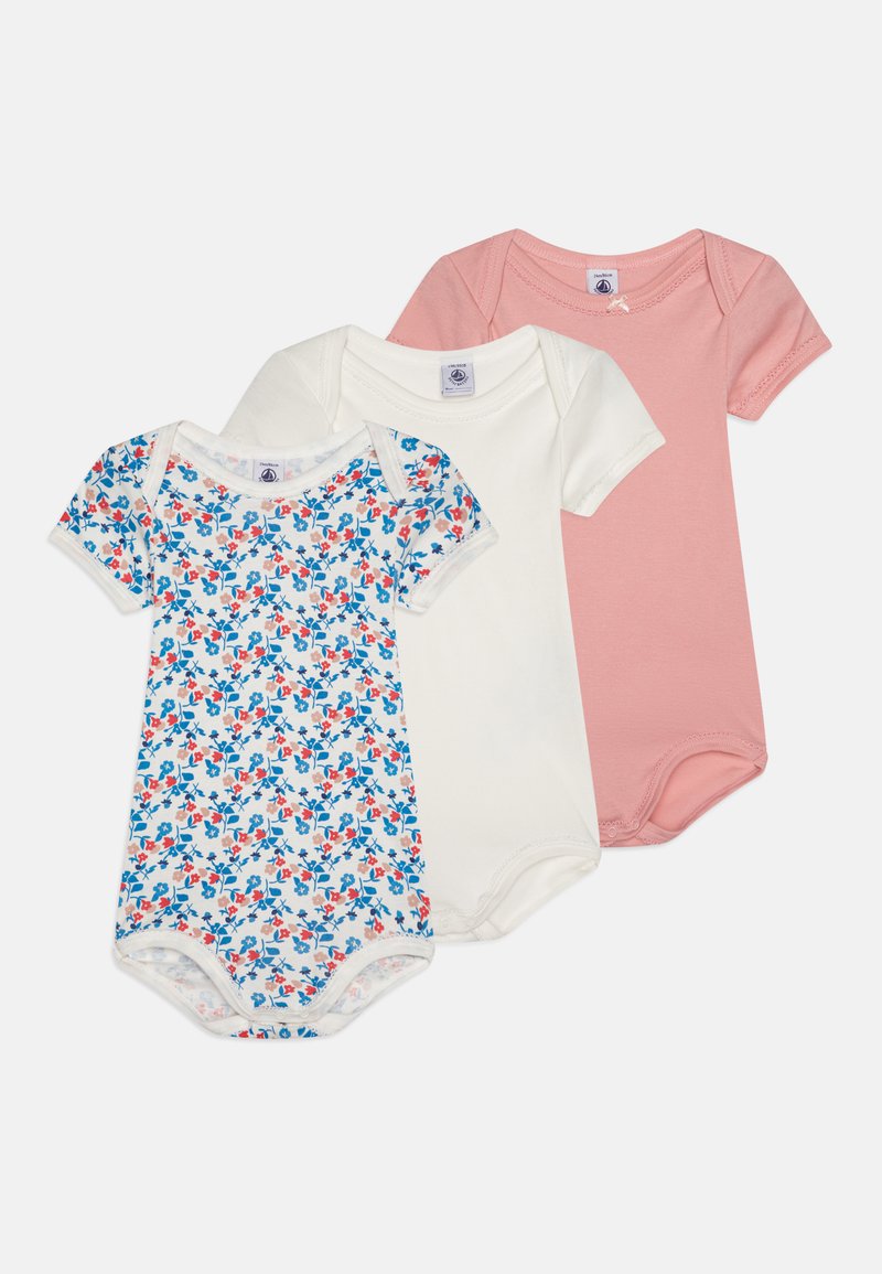 Three short-sleeve bodysuits: one with a floral pattern in blue and red, a plain white, and a pink, all with snap closures at the bottom.