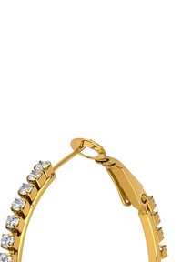 Gold hoop earring featuring a row of clear, circular rhinestones. The design includes a hinged clasp and a smooth shiny surface.