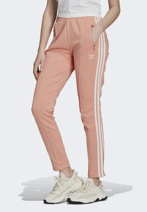 SST PB SLIM - Tracksuit bottoms - apricot
