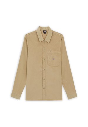 Camicia in corduroy beige con colletto classico, maniche lunghe, chiusura frontale con bottoni e taschino sul petto con toppe logo. Texture liscia.