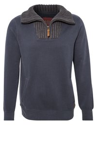 Granatowy pulower z długimi rękawami, żebrowanym kołnierzem dzianym i suwakem na ćwierć długości, wyposażony w boczne kieszenie i luźny krój.