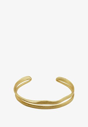 Bransoletka rękawiczkowa w kolorze złotym z metalu, wyróżniająca się teksturowanym, falistym wzorem, o otwartej sylwetce i dwóch równoległych paskach.