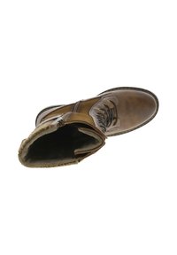 Botte en cuir marron avec un design à lacets, doublure en fourrure et fermeture éclair sur le côté. Caractéristiques d'une semelle robuste avec des coutures le long des bords.