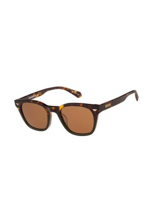 Rechteckige Schildpatt-Sonnenbrille mit braunen Gläsern und dünnen Bügeln, mit einem kleinen metallischen Detail nahe den Scharnieren.