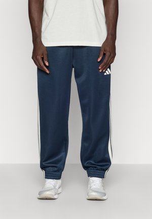 STADIUM - Trainingsbroek - aurora ink/off white