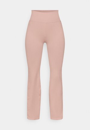 Rosa ribbade högmidjade utsvängda leggings med en slät textur och en figurnära siluett, med en sömlös midjeresår och utan synliga fästen.