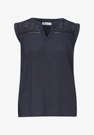 Blouse sans manches bleu marine avec col en V, empiècement en dentelle florale et motif décoratif ajouré sur le devant en haut.