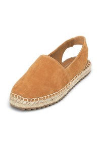 Chaussure slip-on en daim beige avec bout rond, dos ouvert, et détails en corde de jute le long de la semelle. Semelle en caoutchouc plat pour une meilleure adhérence.
