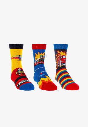 Three colorful children's socks with firefighter themes including a fireman, firetruck, burning building, and flames with red, blue, yellow stripes.