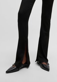 HUGO Spodnie materiałowe